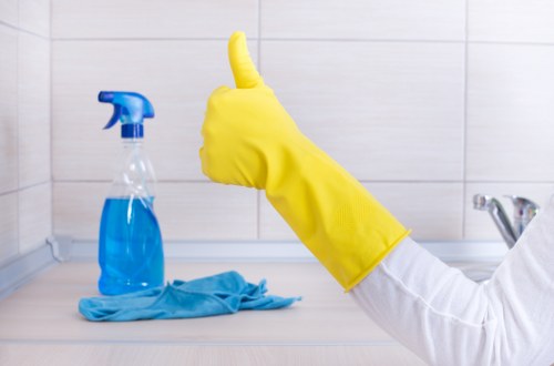 Confident customer completing a safe Brixton Carpet Cleaners payment